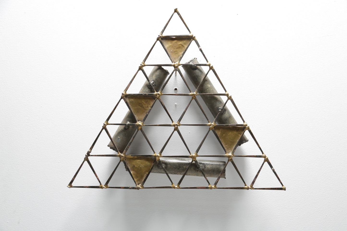 Brutalist triangular wall sculpture in the style of Ron Schmidt